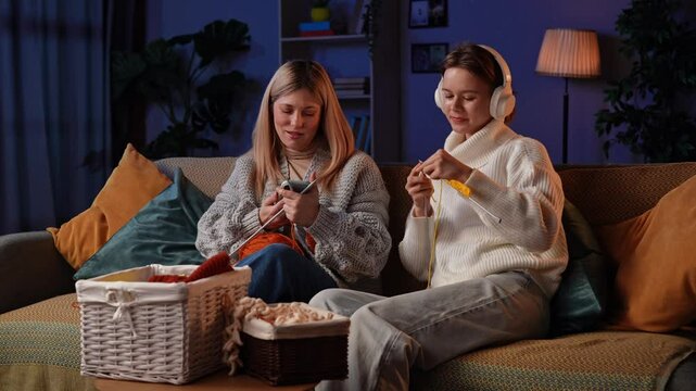 Evening Knitting Session With Girlfriends While Enjoying Cozy Soft Yarn and Creativity