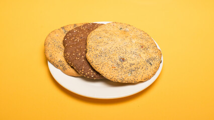 Fast food on plate with yellow background