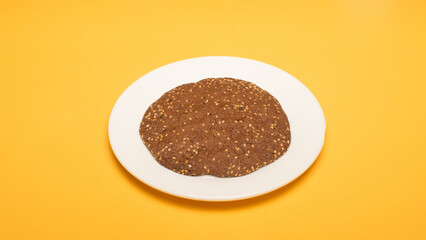 Fast food on plate with yellow background
