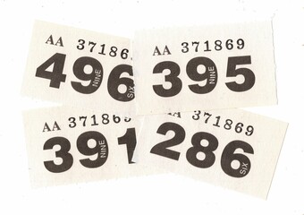 Vintage raffle tickets on a white background.