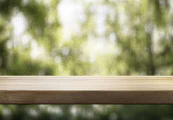 Fototapeta premium Wooden table top with blurred green nature background.