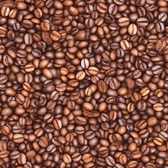 Obraz premium Roasted Coffee Bean Texture: A close-up, textured view showcases a multitude of roasted coffee beans, their rich brown hues and irregular shapes create a pattern.