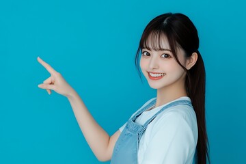 Young woman pointing at something