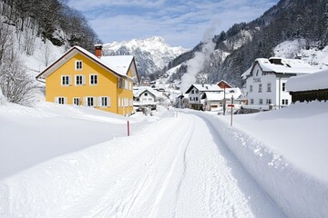 Naklejka premium A charming winter village covered in snow, with smoke rising from chimney tops