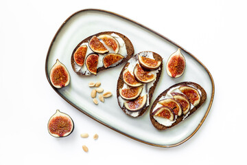 Fig sandwiches with cheese and honey for breakfast. Top view