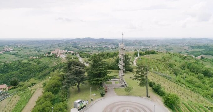 Aerial drone view pan of the Collio hills, Cormons, Nova Gorica near Gorizia. European Capital of Culture 2025. Typical local products vineyards and wines. Gonjače Tower places to visit and tradition.