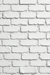 Obraz premium Distressed white brick wall with subtle shadows , design, mortar