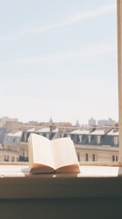 Fototapeta premium Book sitting on the window paris view publication architecture transparent.