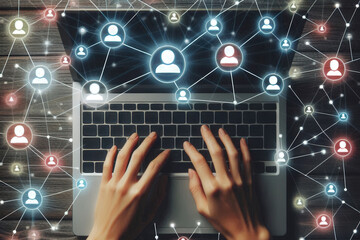 A top-down view of a man's hands typing on a laptop keyboard, surrounded by a network of interconnected, colorful human icons, symbolizing a social or collaborative network.