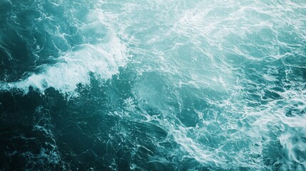 Acrylic fluid painting, overhead shot of abstract sea, dark green waves with golden foam accents, marble-textured background, soft light reflections
