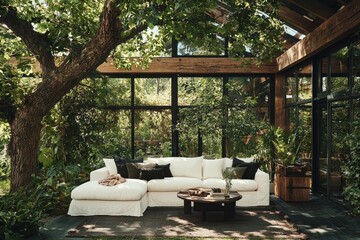 Fototapeta premium This country boho-style living room in a farmhouse features a corner sofa that is white in color