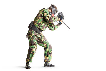 Painball player in action isolated om white bacground