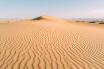 Endless sandy dunes create serene landscape with intricate rippl