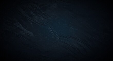 Abstract Texture: A dark, textured background resembling a marble or watercolor effect, perfect for design elements and artistic concepts.