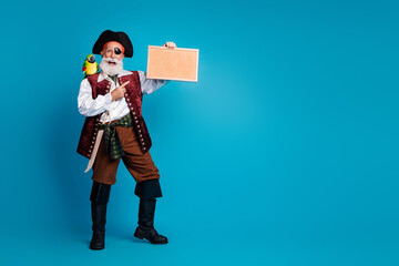Full size photo of old funny pirate male hold point picture frame dressed carnival party costume...