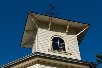 low angle view to a window with a mannequin in it