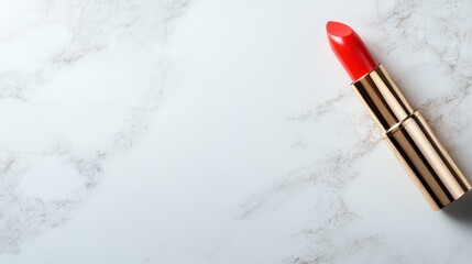 A striking red lipstick elegantly displayed against a polished marble background emphasizes luxury and beauty, ideal for fashion and cosmetic stock photography.