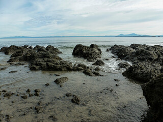 The rocky shore on part of Playa Matapalo in Guanacaste, Costa Rica