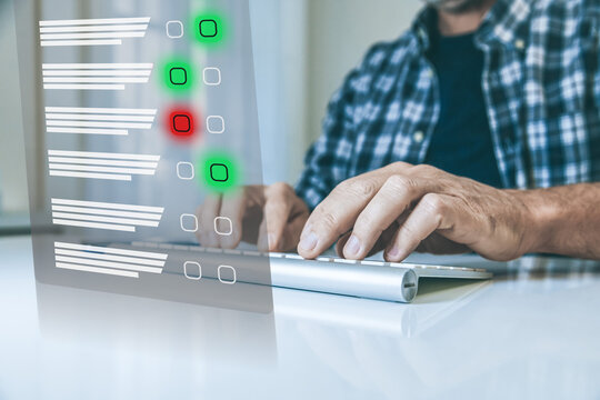 Man do online exam on virtual screen. Answer a survey filling out a tech form. Quiz, test concept