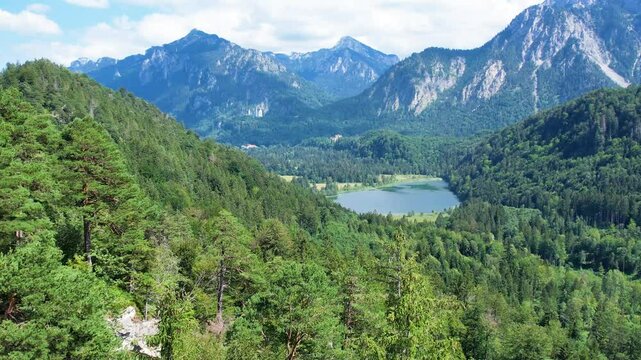 Aerial summer view to Lake Schwansee and mountains in Germany Alps