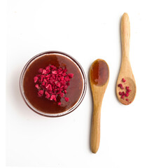 bowl and spoons with raspberries