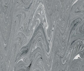 A swirling marbled texture with fluid patterns in shades of gray, creating an elegant and organic design.
