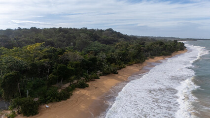 Drone Aerial view at sunrise of the beautiful Oasis Bluff Beach hotel and Bluff Beach in Isla...