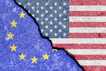 The crack between the flags of the United States and the European Union. The concept of problems in...