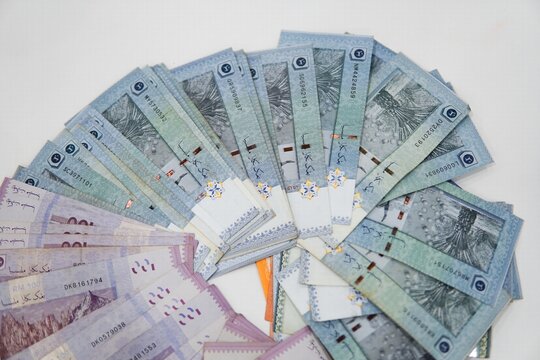 Malaysian ringgit money isolated on white background. currency of Malaysian ringgit banknotes background. Paper money. Financial concept.
