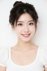 Female Asian Model with Short Hair - Young Beautiful Woman with Hair Bun - Studio Portrait of Asian Beauty for Fashion, Cosmetic, Skincare - Posing on White Background - Smooth Tied Hair