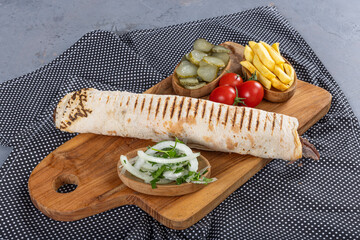 Meat Wrap Doner. Beef shawarma sandwich fresh roll, wrap of grilled meat and salad tortilla wrap...