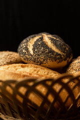 Homemade freshly baked scones on a plate on a black background. Homemade cakes