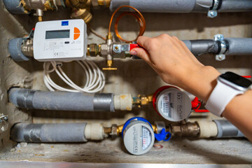 Smart water and heat meters with remote data transmission installed in a European utility system. The concept represents modern energy efficiency and digital infrastructure development