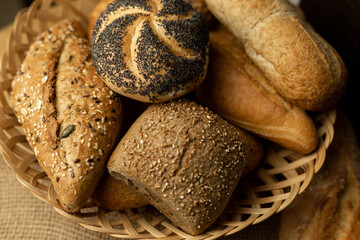 Homemade pastries. The buns are in a wicker basket. Top view