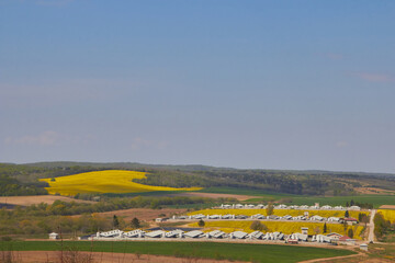 landscape of farm buildings, Aerial View Of Farm Buildings Surrounded By Fields rapeseed spring