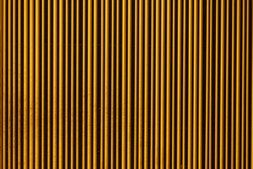 Obraz premium Wall decor. Golden rods decorate the wall. Abstraction of repair