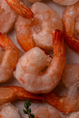Frozen uncooked prawns or shrimps with lemon