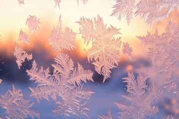 crystalline frost patterns forming intricate natural mandalas on window glass, backlit by soft pink-orange sunrise glow, creating delicate ice geometry against winter morning sky