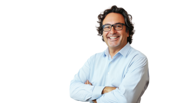 Smiling middle-aged man in glasses posing confidently with arms crossed, professional portrait on isolated white background for business and lifestyle concepts.