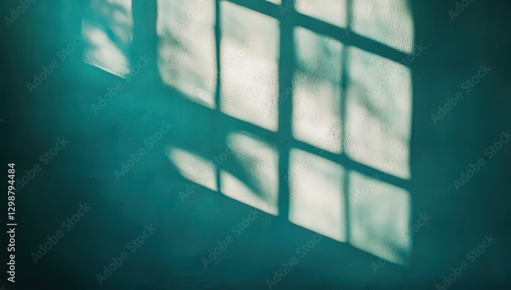 Poster soft shadows of window panes on a textured wall creating an artistic play of light and color in a se