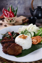 Selected Focus Rendang or Randang is The Most Delicious Food in the World. Made from Beef Stew and Coconut Milk with Various Herbs and Sice. Typically food from Minang Tribe 2