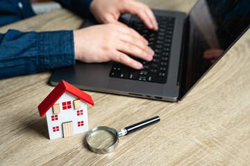The concept of searching for housing via the Internet. Find an apartment for rent online. Property...