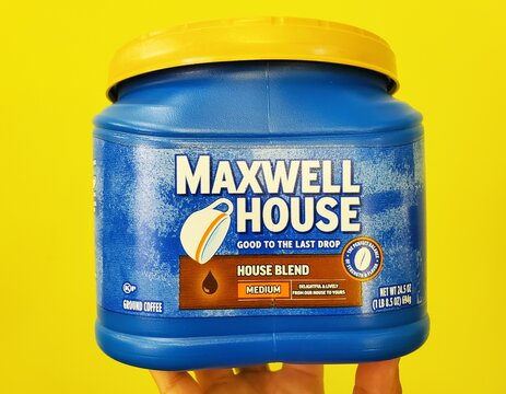 Wilmington, Delaware, U.S.A - Feb 26, 2025 - A vibrant blue canister of Maxwell House with House Blend flavor coffee, ready to brew a comforting morning.
