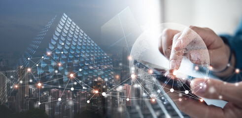 Internet global network connection, digital technology, digital marketing, IoT internet of things. Man using smart phone and laptop computer with internet network connection, technology background
