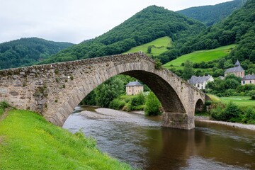 Fototapeta premium A medieval stone bridge arching over a slow-moving river, surrounded by ivy-covered ruins