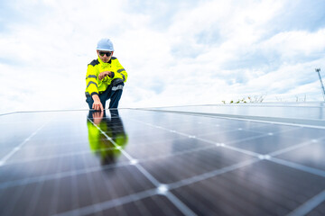 Fototapeta na wymiar A skilled technician adjusts a solar panel on rooftop, emphasizing the transition to sustainable energy. Equipped with safety gear, the worker demonstrates precision in renewable energy installations.