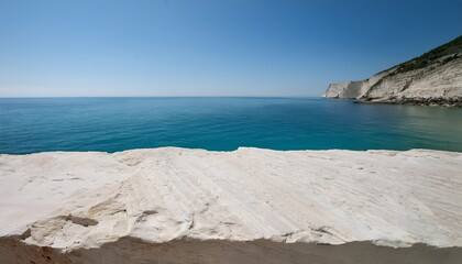 Soft weathered limestone slab for product placement and advertisement near a Mediterranean coastline, with turquoise waters in the background