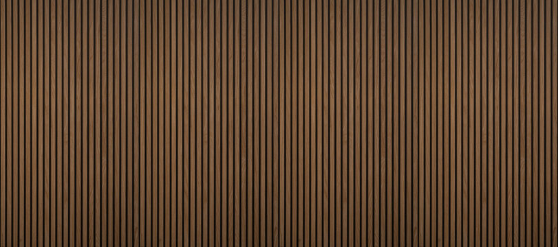 Wood background banner panorama long - Brown wooden acoustic panels wall texture , seamless pattern, vertical