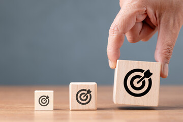 Small, medium, and big target, hand select the biggest target in a row, business and marketing, or...