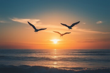 Obraz premium A stunning sunset scene featuring birds flying above tranquil ocean waters, embodying freedom and peace.